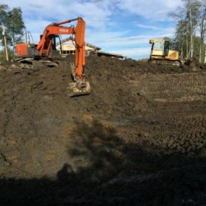 Landscaping Dawson Creek BC 160 Hitachi Excavator Long Stick with Thumb. Creating a Lagoon